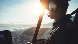 Pilot in Helicopter Cockpit with OEM Replacement Parts