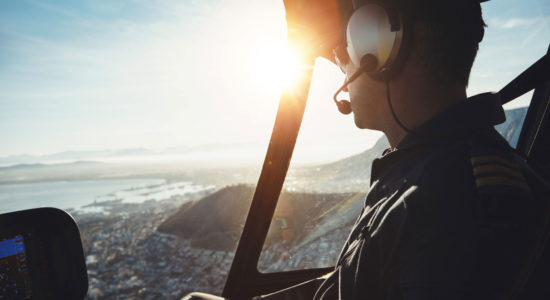 Pilot in Helicopter Cockpit with OEM Replacement Parts